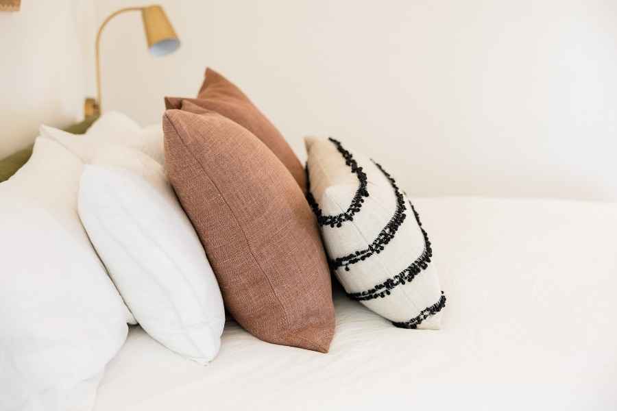 Modern pillows a top a bed