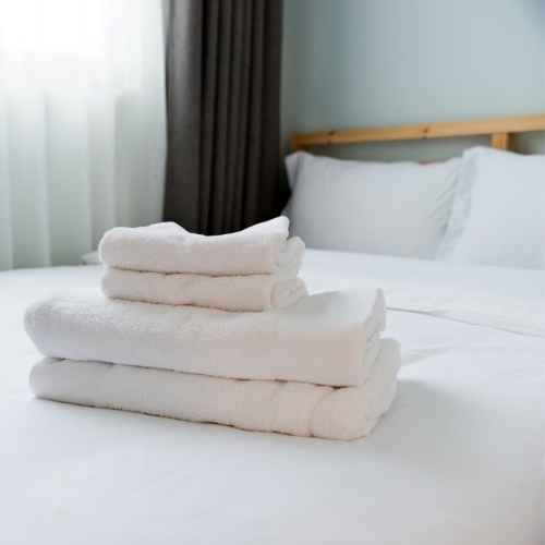 White towels a top hotel bed
